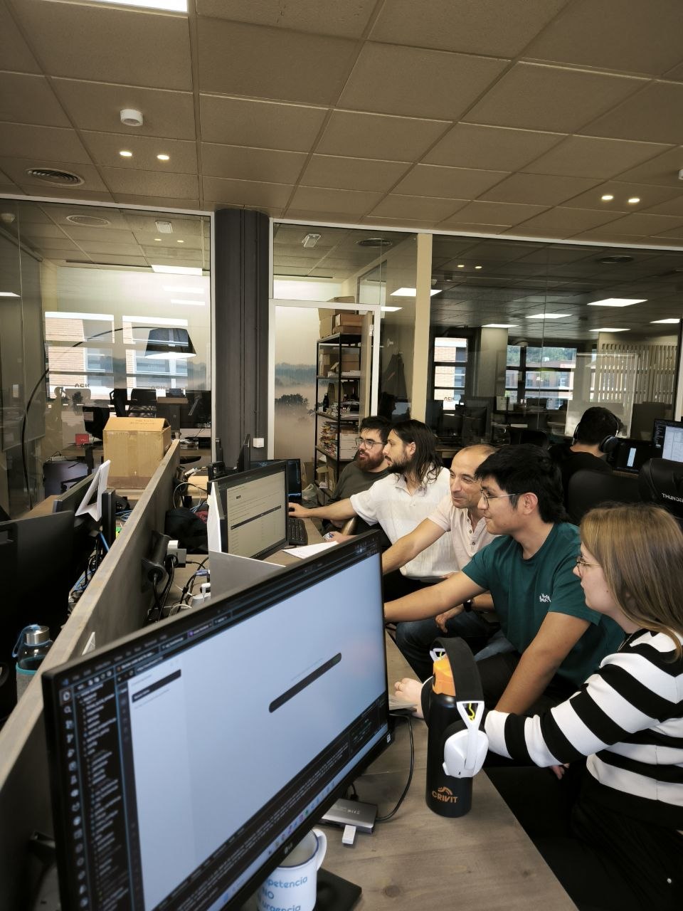 WizeeMind team reviewing industrial plant operations in a control room